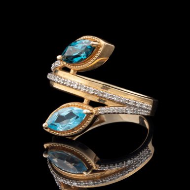 By-Pass Design 14K Blue Topaz and Diamond Ring