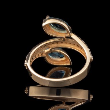 By-Pass Design 14K Blue Topaz and Diamond Ring